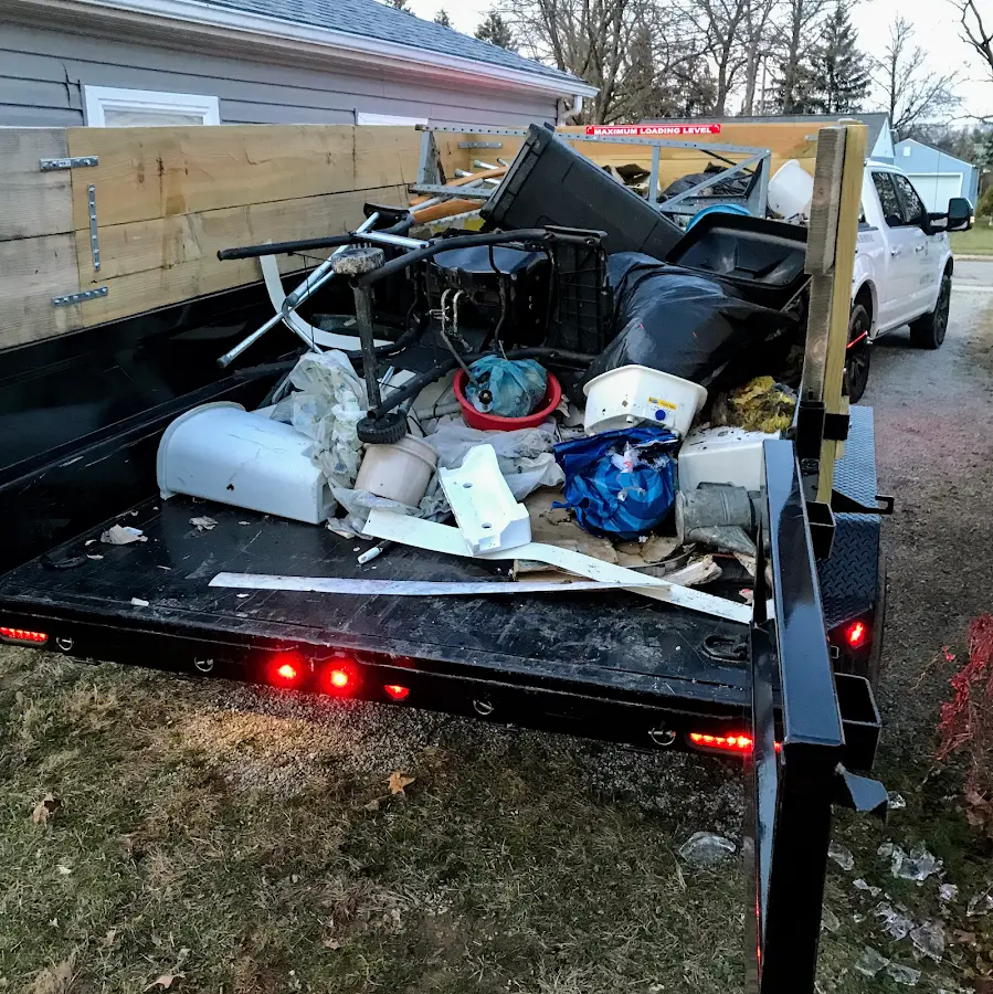 Roll-off dumpster delivered to a residential driveway in Alexander City